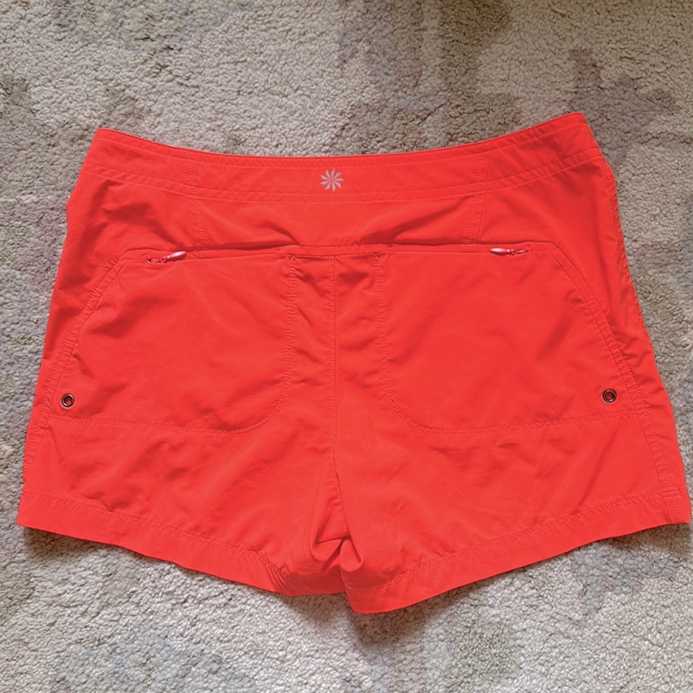 Athleta Orange Shorts. Size 0 - Picture 2 of 4